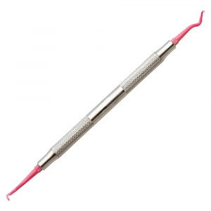 Plastic curette for dental implants, photo